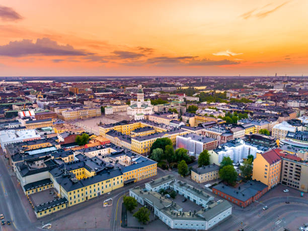 Aerial view of Helsinki at sunset, Finland This pic shows Aerial view of Colorful Helsinki during sunset time. The pic is taken by drone and at sunset in evening. The pic is taken in helsinki finland and in june 2019. market square stock pictures, royalty-free photos & images