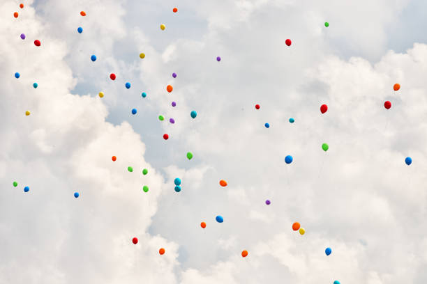 istock balloons on overcast white background sky 1158060198