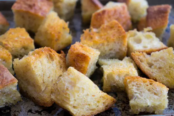 Toasting bread to make croutons