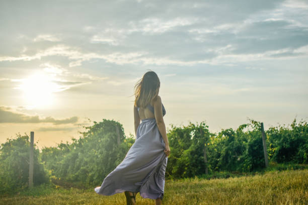 istock Beautiful woman in a meadow 1158067918