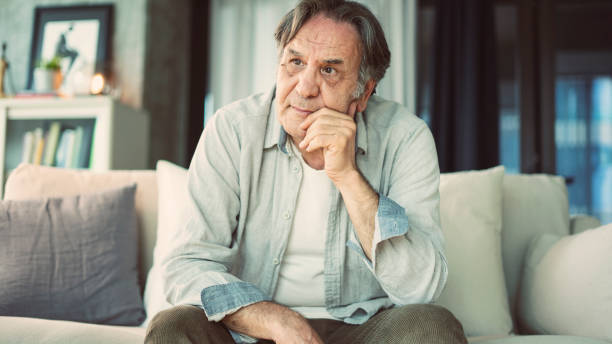 istock Portrait of thoughtful senior man 1158069057