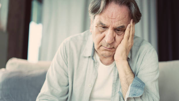 istock Portrait of thoughtful senior man 1158069058