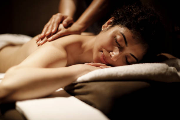 istock Beautiful woman enjoying in massage 1158069490