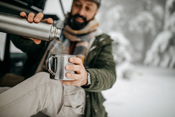 istock Coffee break in snowy forest 1158070226