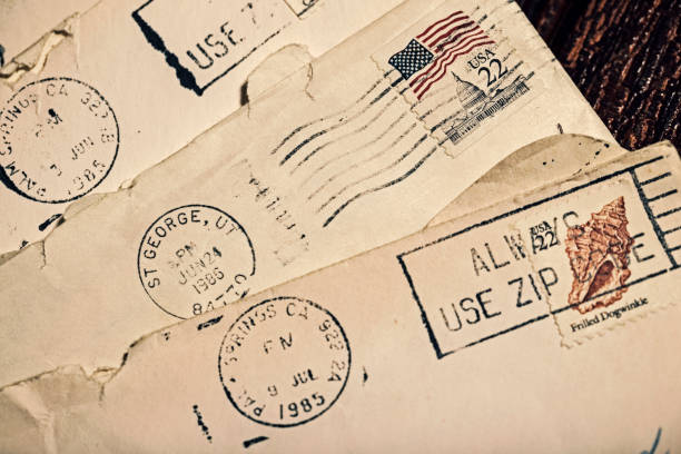 Old Letters in Envelopes with Postmark and Cancelled Postage Stamp