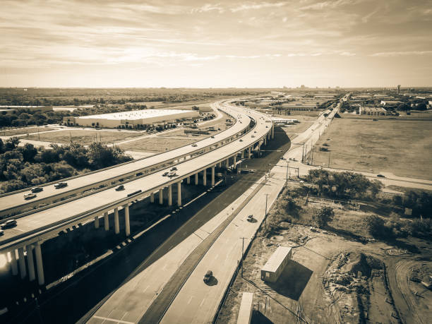 istock Filtered tone aerial view elevated expressway through water zone and construction site 1158071498