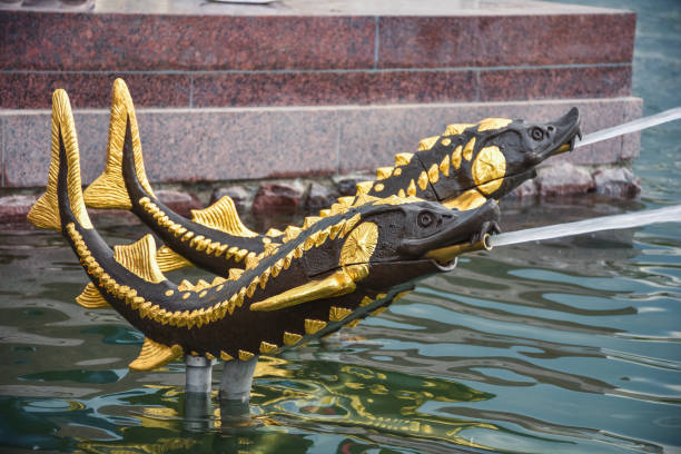 Pillar with Golden Lizard in gothic style . Design details of Pont Alexandre III in Paris \