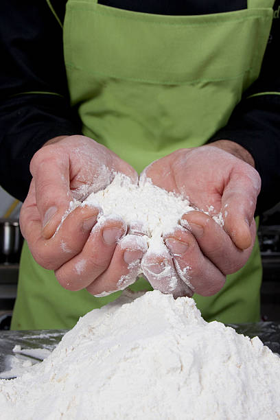 Baker and flour stock photo