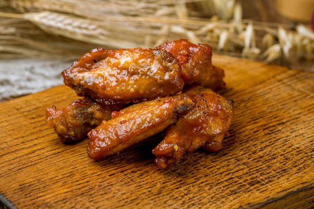 istock chicken wings in barbecue sauce 1158077465