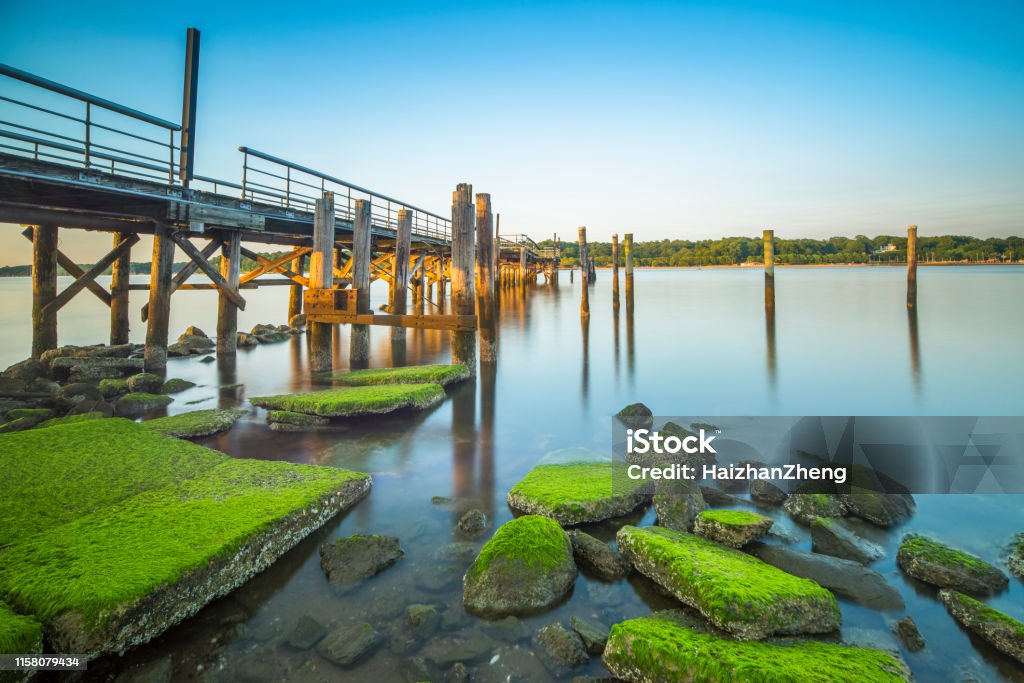 A fishing pier during dusk Jones Beach, Long Island, New York State, USA, Architecture New York State Stock Photo