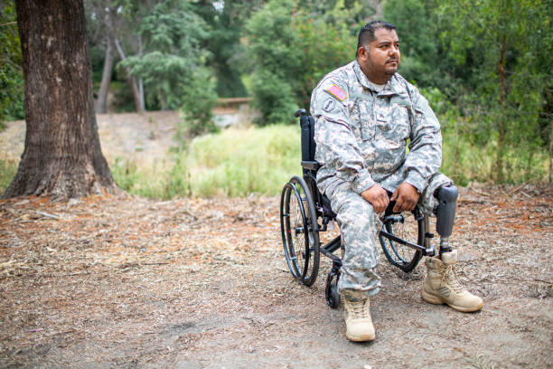 istock Army Veteran in Wheelchair 1158079788