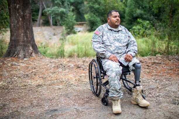 istock Army Veteran in Wheelchair 1158080642
