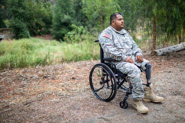 istock Army Veteran in Wheelchair 1158080703