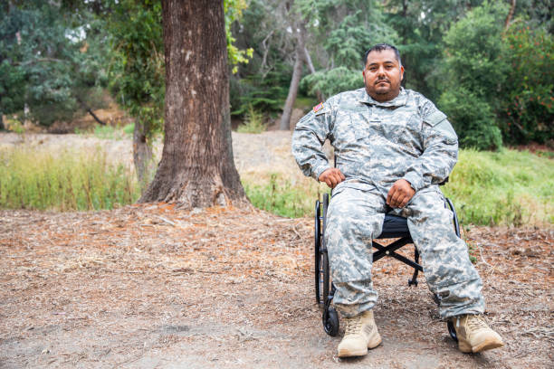 istock Army Veteran in Wheelchair 1158081604