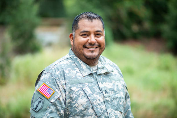 Portrait of a Latino Veteran A hispanic veteran wearing his uniform us marine corps stock pictures, royalty-free photos & images