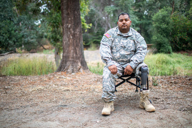 istock Army Veteran in Wheelchair 1158083156