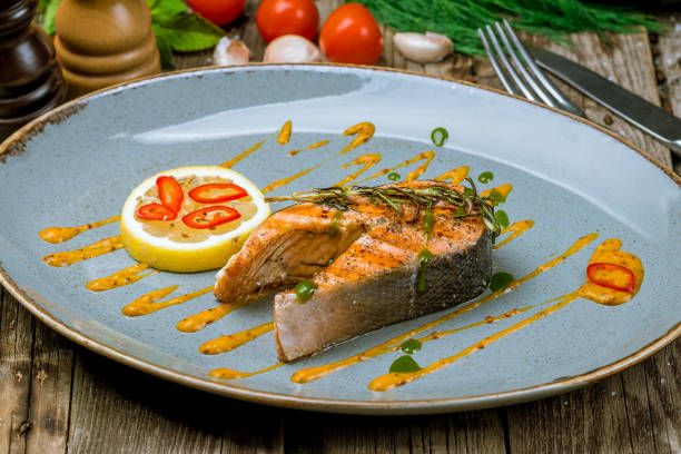 istock Salmon steak on the grill 1158083237
