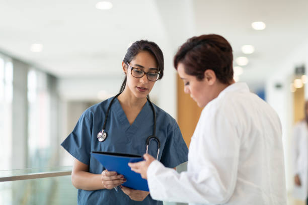 istock Medical team discusses patient's course of treatment 1158085384