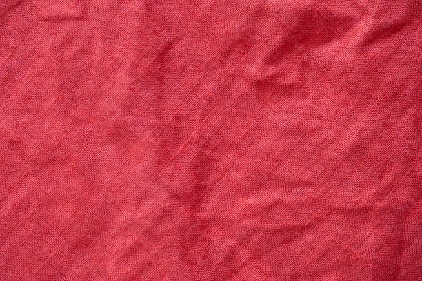 istock Red linen shirt fabric texture background 1158086135