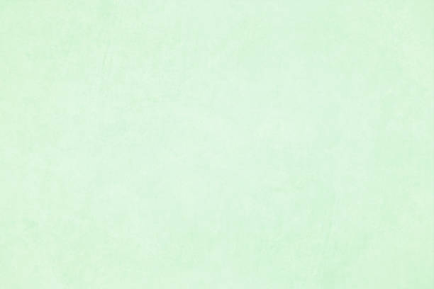 istock Horizontal vector Illustration of an empty light green color grungy textured background 1158091338