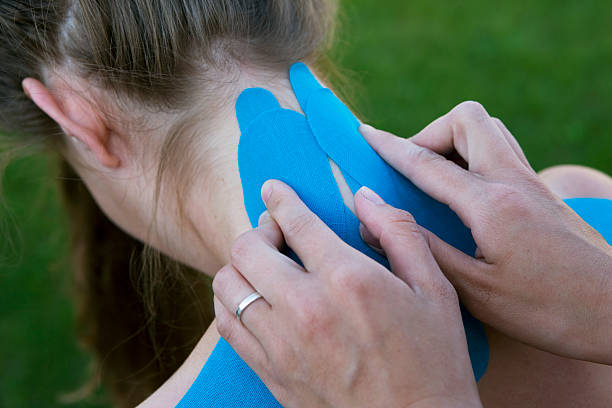 istock hands of a female physiotherapist at work 115809311