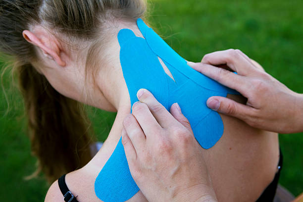 istock hands of a female physiotherapist at work 115809370