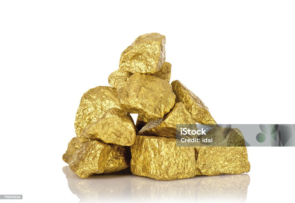 Several gold nuggets in a stack isolated on white The gold nuggets isolated on white Remote Location Stock Photo