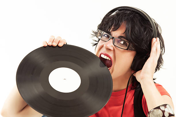 istock girl biting a vinyl 115810669