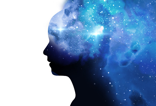 silhouette of virtual human with aura chakras on space nebula , represent meditation,yoga 
and deep sleep therapy.