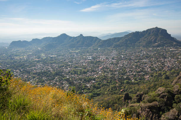 Archaeological Zone the Tepozteco Hike View from the hike up to Zona Arqueológica el Tepozteco. morelos state stock pictures, royalty-free photos & images