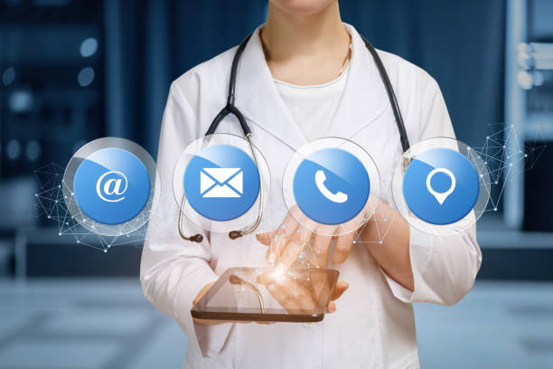 istock Doctor shows contact icons . 1158115629