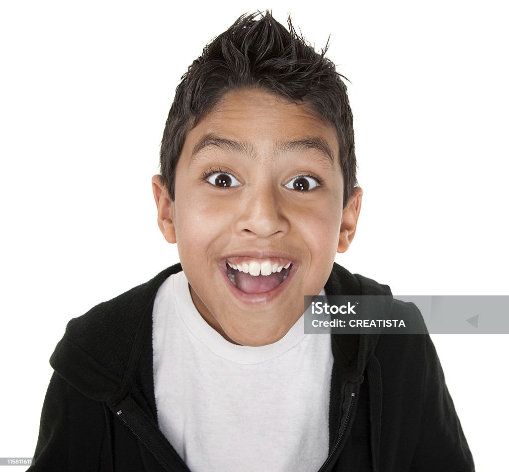 Very Happy Youngster Cute boy with a giant smile on a white background Child Stock Photo