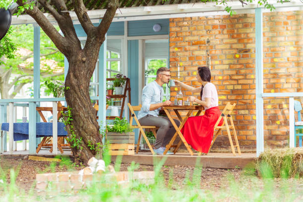 istock Beautiful couple drinking tea during their date. 1158117344