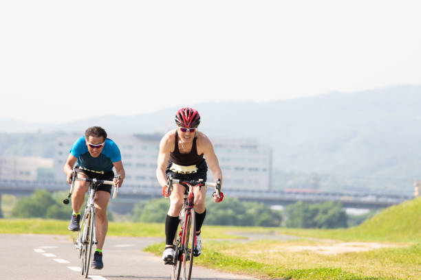 istock Japanse senior cyclists racing 1158117588