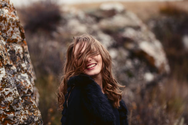 istock happy smiling woman in autumn 1158119609