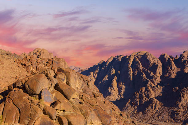 istock Beautiful view from the mountain. Panorama. Mountain range with visible silhouettes through the morning blue fog 1158123958
