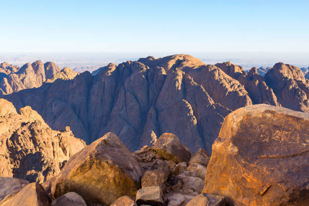 istock Beautiful view from the mountain. Panorama. Mountain range with visible silhouettes through the morning blue fog 1158123980