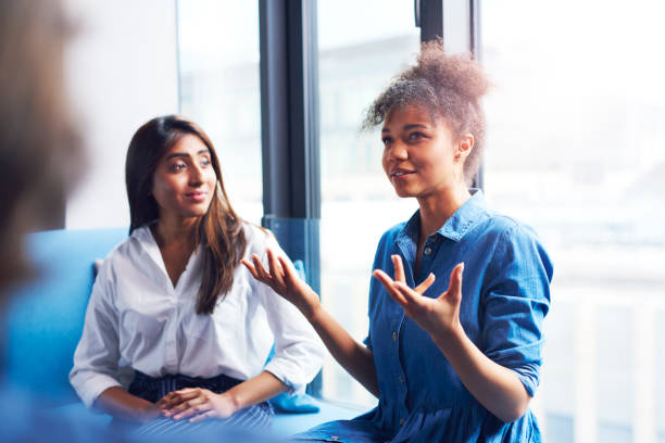 istock Two businesswomen in conference room 1158124869