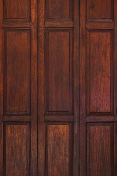 istock Dark brown old ancient wooden wall background. Thailand traditional style. Using as wallpaper or decorate interior. 1158126492