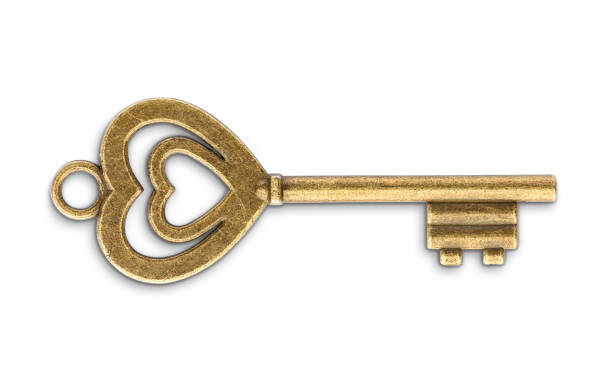 istock Vintage golden skeleton key isolated on white background 1158126690