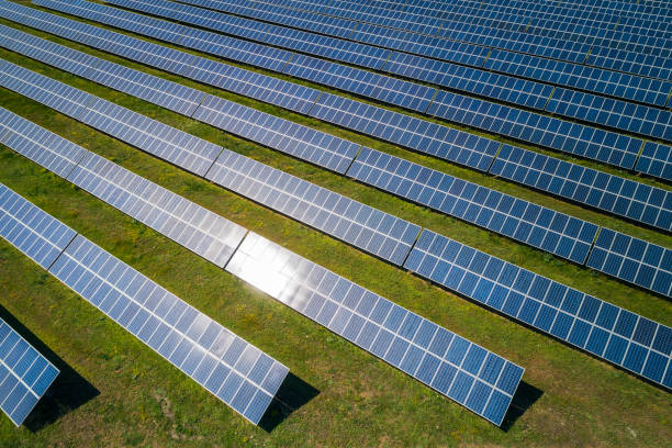 istock Solar panels. Solar Power station with a Clear Blue Sky and Sun Rays. 1158126897