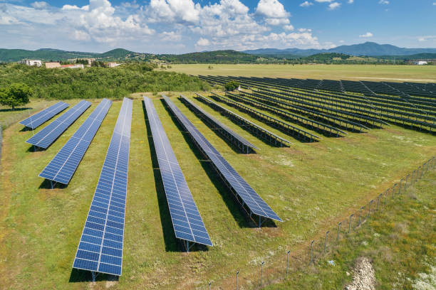 istock Solar panels. Solar Power station with a Clear Blue Sky and Sun Rays. 1158126922