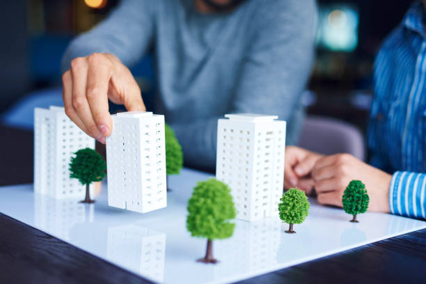 Shot of architectural model on office table Shot of architectural model on office table architectural model photos stock pictures, royalty-free photos & images