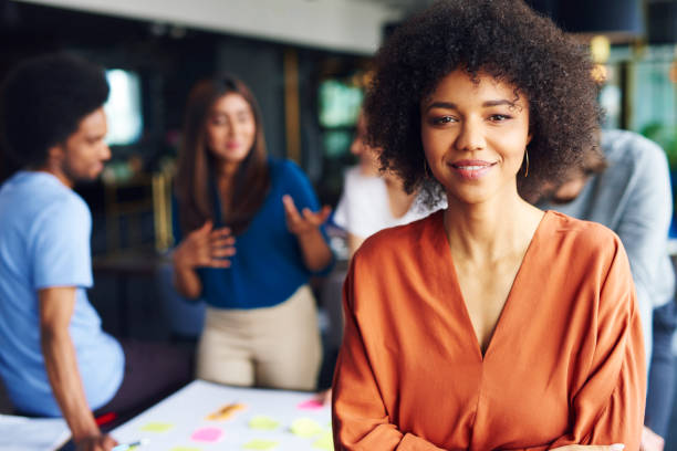 Portrait of African businesswoman leading on this business meeting Portrait of African businesswoman leading on this business meeting powerful women stock pictures, royalty-free photos & images