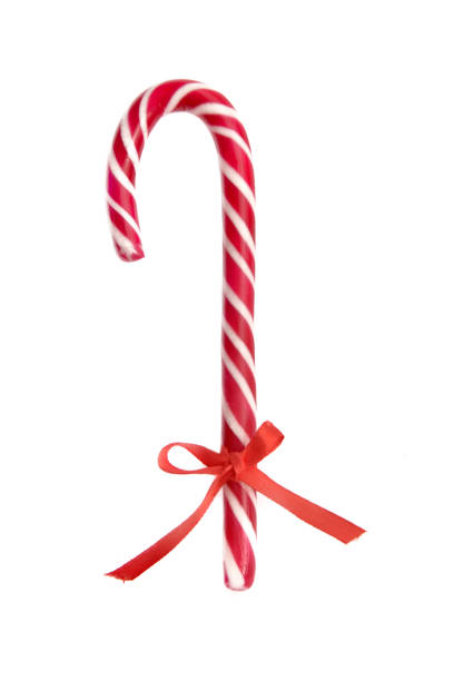 istock red candy cane with a ribbon isolated 1158127994