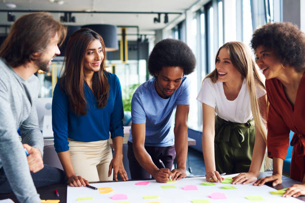 istock Multi ethnic group of business people sharing new ideas 1158128020