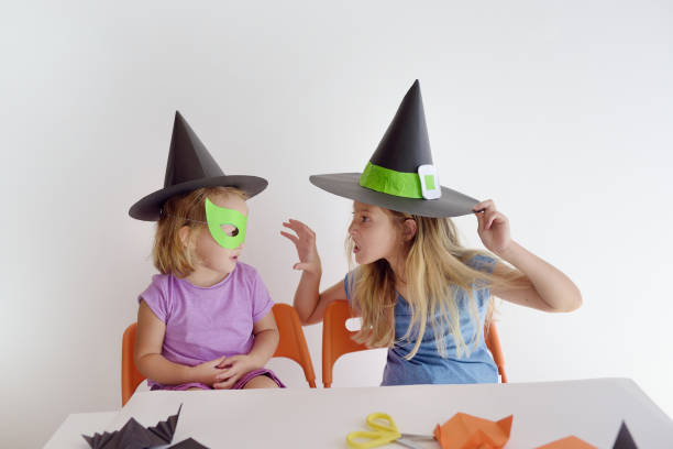istock Two kids in carnival costumes for Halloween. 1158130207