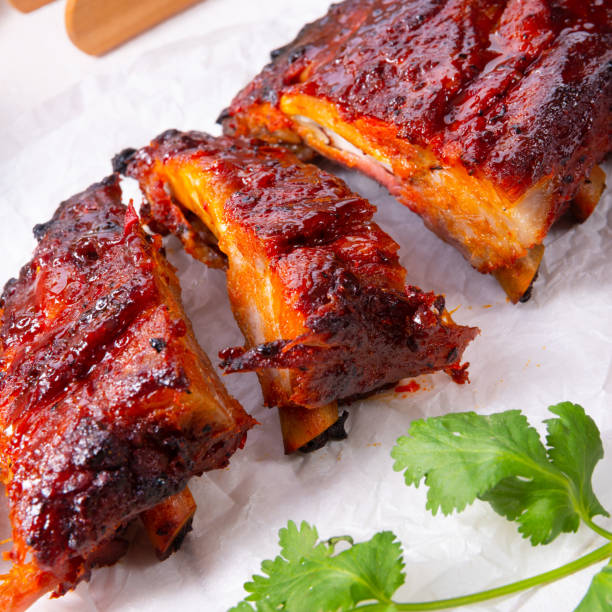 istock BBQ spare ribs from a charcoal grill 1158130394