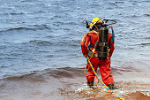 istock Professional diver enters the water to produce deep-sea works. 1158130515