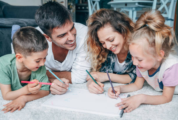 istock Young happy family drawing 1158134681